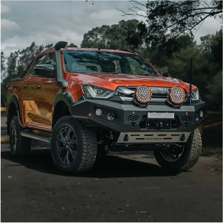 Orange off-road pickup truck with Rockarmor GT Bull steel bull bar and driving lights