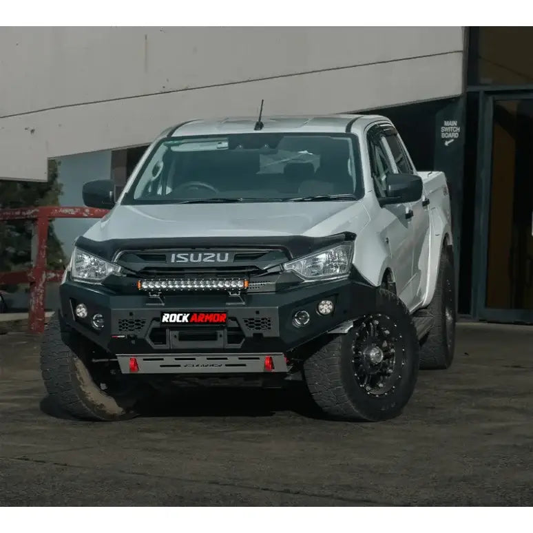 White Isuzu pickup truck with Rockarmor GT Bull steel bull bar and driving lights