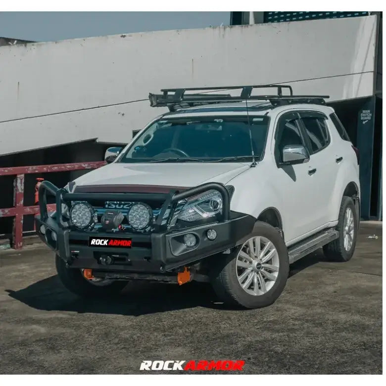 White isuzu mux 2013-2017 with rockarmor elite hoop bull bar featuring fog lights and aftermarket roof rack