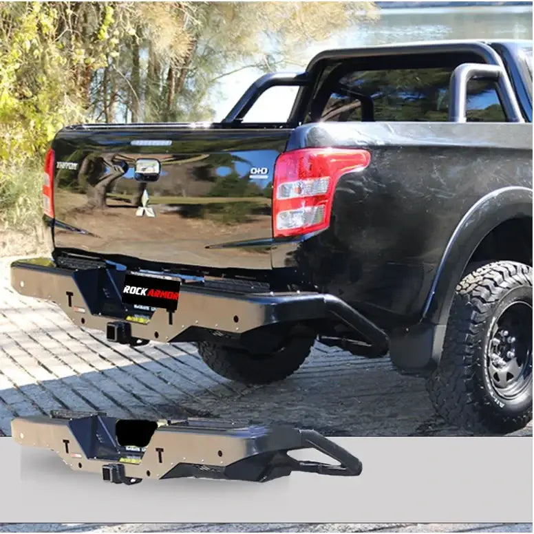Back view of a black truck fitted with rockarmor elite steel rear step and elite rear tow for mitsubishi triton mq 2015 2018