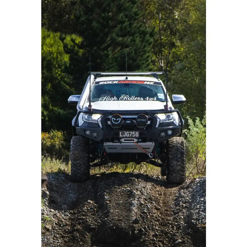 White off-road ford ranger px2 with rockarmor gt steel steel hoop bullbar and synthetic winch rope combo pack installed