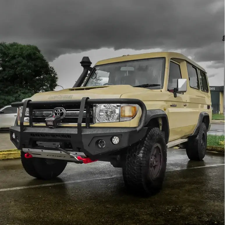 Beige toyota vdj78 land cruiser with rockarmor gt steel hoop bullbar combo pack aftermarket steel bumper