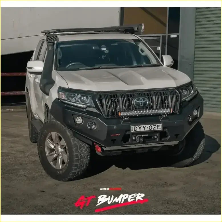 White toyota land cruiser prado with black gt hoopless bullbar and roof rack from rockarmor rock pack