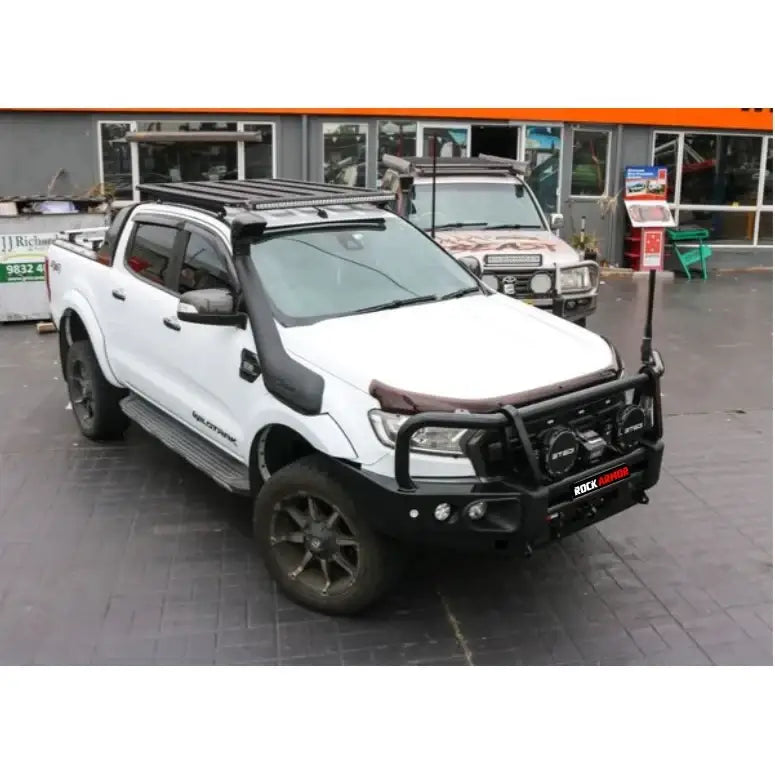 White ford ranger px dual cab with rockarmor steel rockslider side steps in steel checker plate shown from back side
