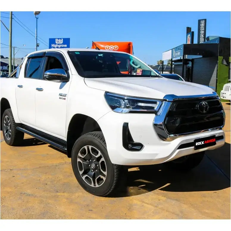 White toyota hilux n80 equipped with rockarmor steel rockslider checker plate side steps rear view fitting video