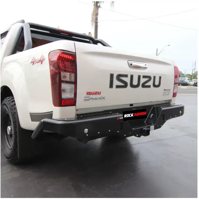White isuzu d-max pickup truck rear view fitted with rockamor elite steel steel rear step towbar assembly