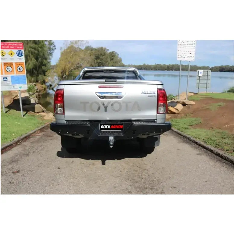 Silver toyota hilux n80 rear view with rockamor elite steel rear step and towbar for 2015 plus models