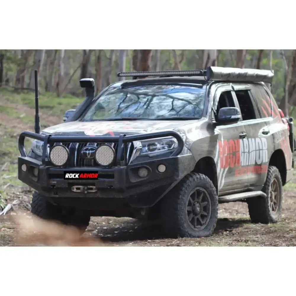Off-road Toyota Prado FJ150 with black Rockarmor Elite steel bull bar replacement full bar for enhanced protection