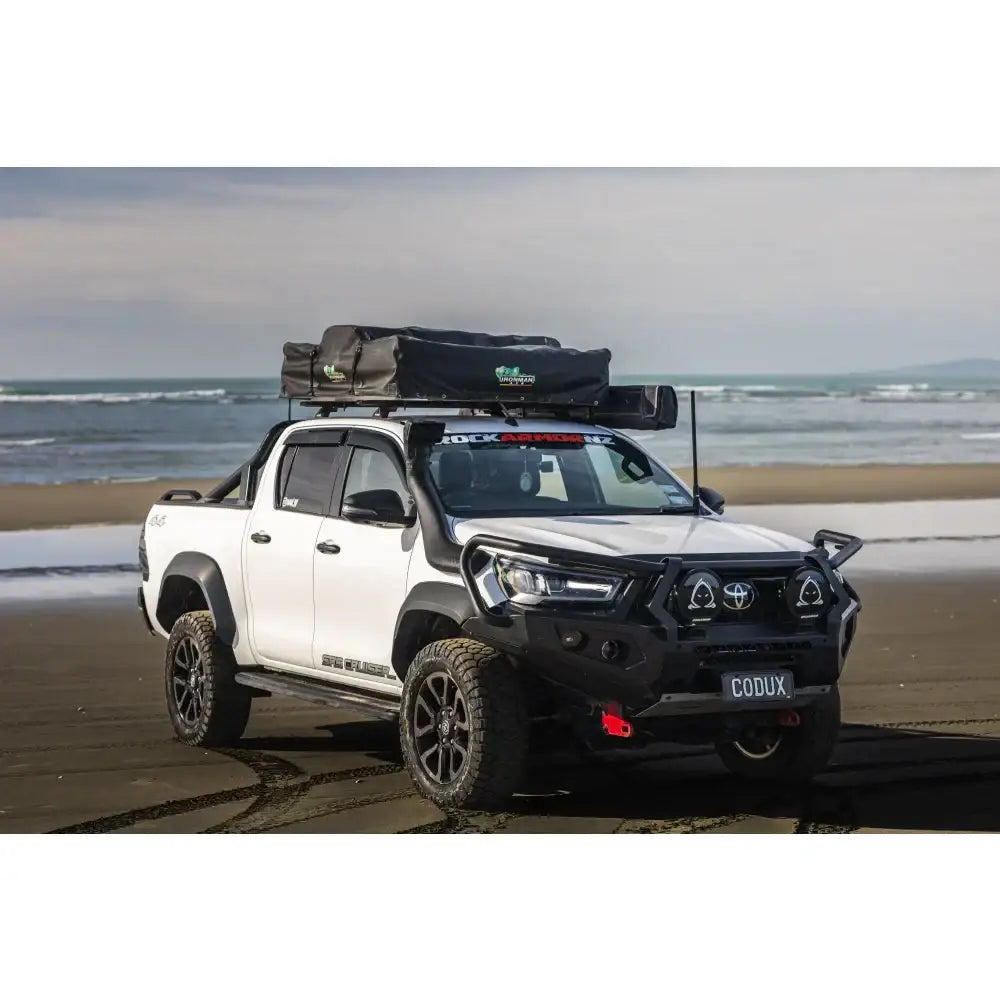 White toyota hilux with black rockarmor gt steel hoop bullbar combo pack and synthetic winch rope off-road setup