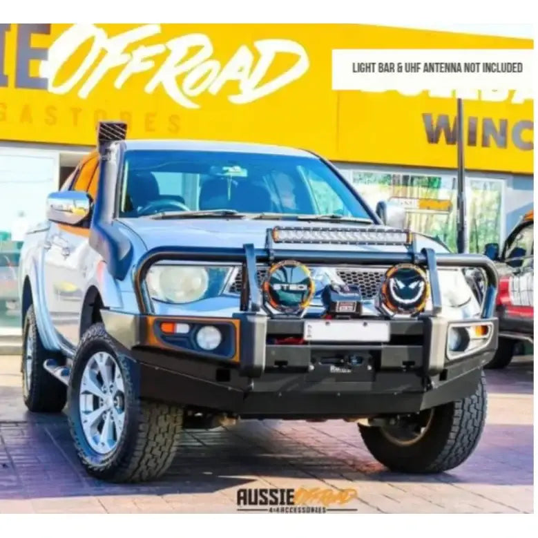 Silver off-road Mitsubishi Triton Challenger with Rockarmor premium bullbar and synthetic winch rope frontal combo