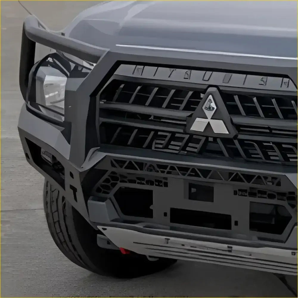 Black metal front bumper with integrated grille and mitsubishi logo for rockarmor rock pack triton 2024+