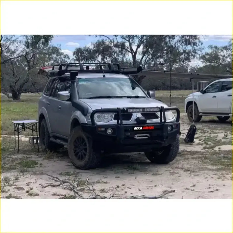 Silver mitsubishi triton challenger suv with black rockarmor bullbar and roof rack 2009-2015 model