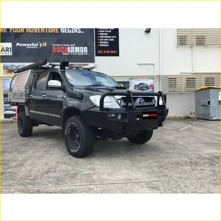 Black toyota hilux n70 with rockarmor premium bullbar and roof rack perfect for tough offroad use
