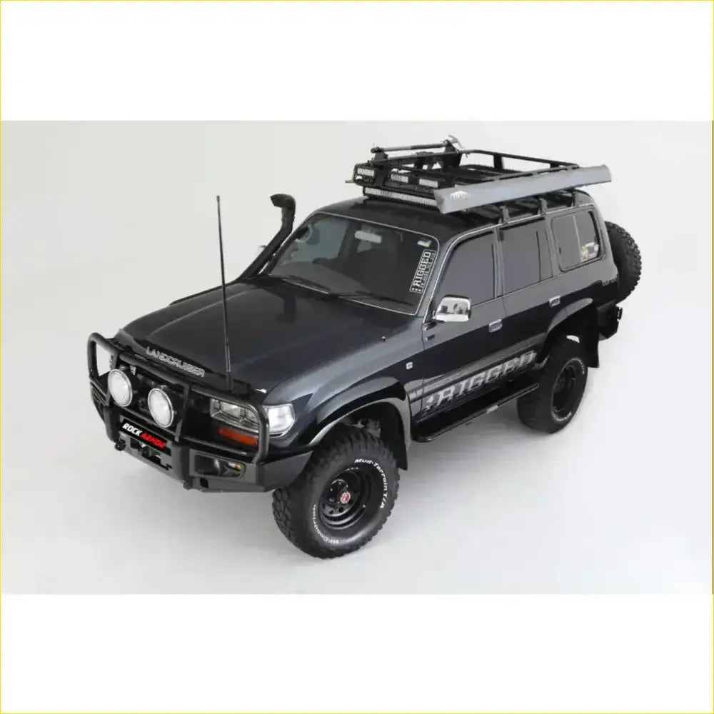 Black toyota land cruiser fj80 1992-1997 with rockarmor rock pack premium bullbar rugged off-road roof rack shown from back