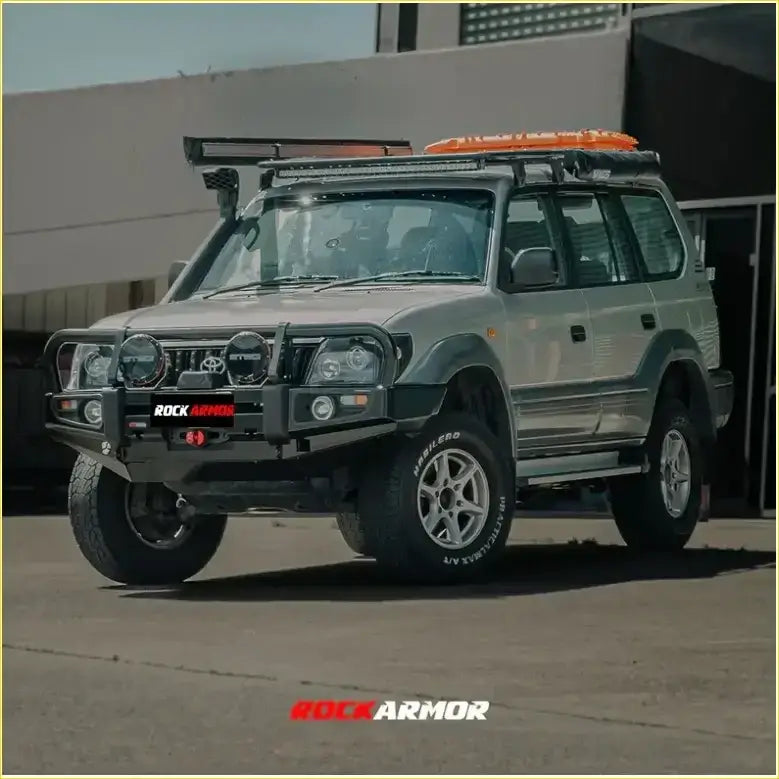 Silver toyota land cruiser with black rockarmor rock pack bullbar and roof rack for prado 1996-2002