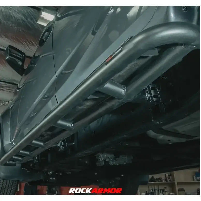 Gray steel rock armor rock slider side step with 52mm diameter tubing for isuzu dmax 08/20+ vehicles