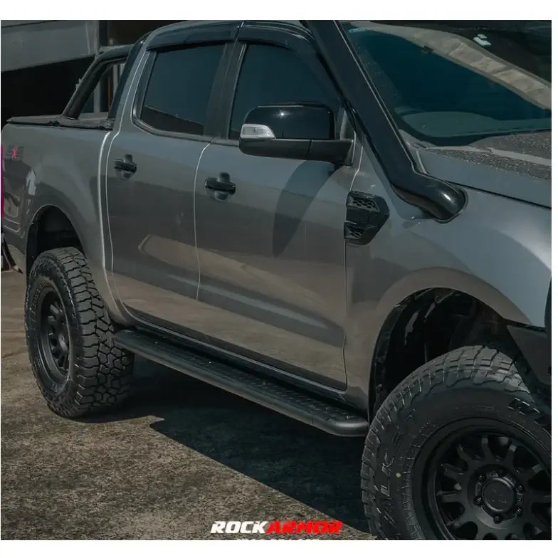 Gray pickup truck with rockarmor steel rockslider side steps in steel checker plate for ford ranger px1 px2 px3 dual cab