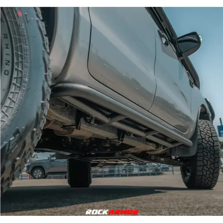 Rockarmor steel rockslider side steps made of black steel checker plate for ford ranger px dual cab 2012-2022 shown from side