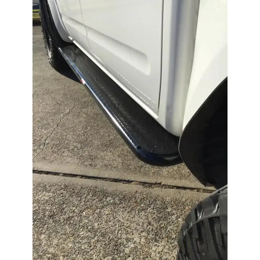 Black rockslider steel running board with steel checker plate for Nissan Navara D40 side steps, rear view