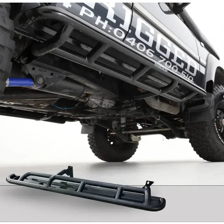 Black metal rockarmor steel rockslider side steps with checker plate step for Toyota Landcruiser Fj80 1990-1997 back side view