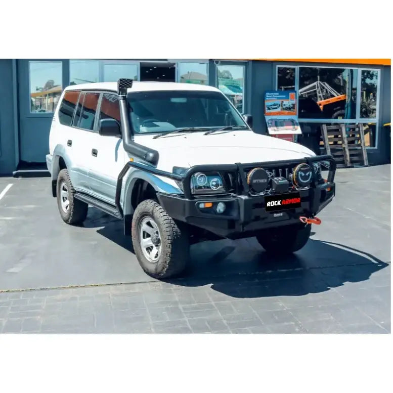 White off-road vehicle fitted with rockarmor steel rockslider 52mm diameter steel rockslider toyota prado fj90 fit